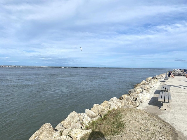 view of playground featuring a water view