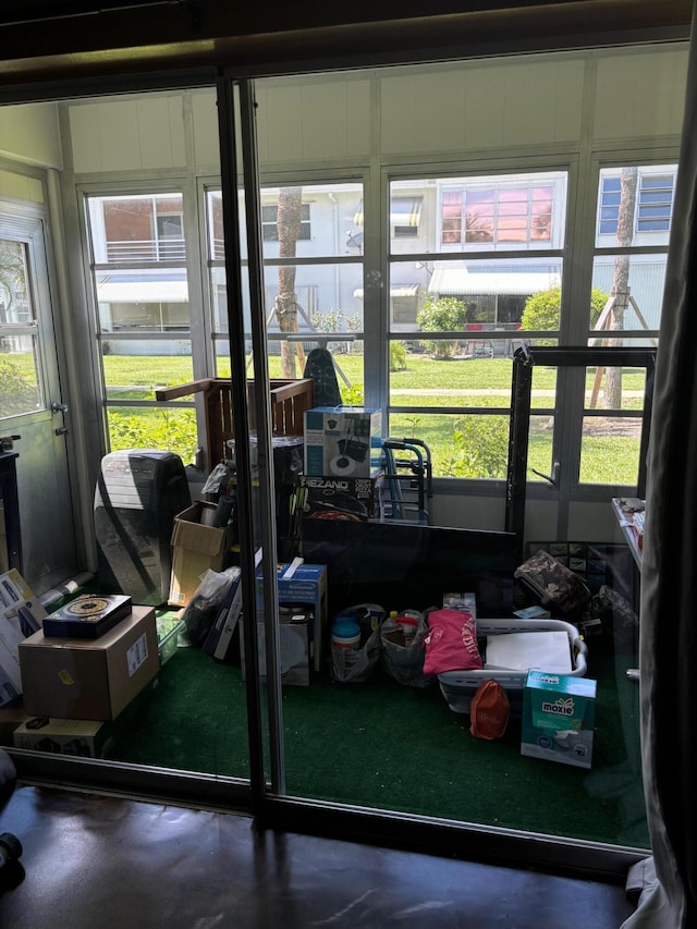 sunroom with plenty of natural light