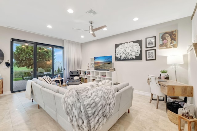 living room featuring ceiling fan