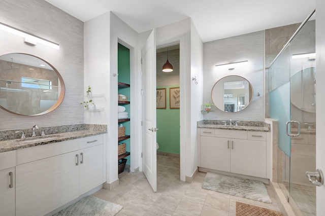 bathroom featuring vanity and walk in shower