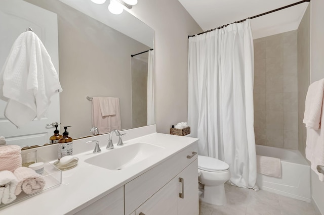 full bathroom with vanity, toilet, and shower / tub combo