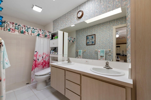 1217 NW Sun Terrace Cir Unit B, Port Saint Lucie, FL 34986 - full bathroom with tile patterned floors, tiled shower, toilet, double vanity, and wallpapered walls