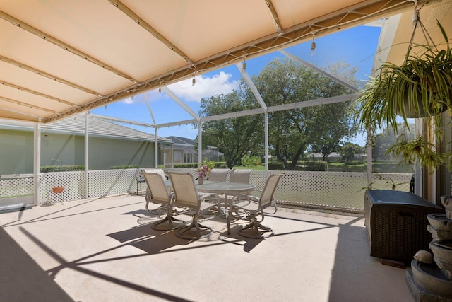 1217 NW Sun Terrace Cir Unit B, Port Saint Lucie, FL 34986 - view of patio with outdoor dining area and a lanai