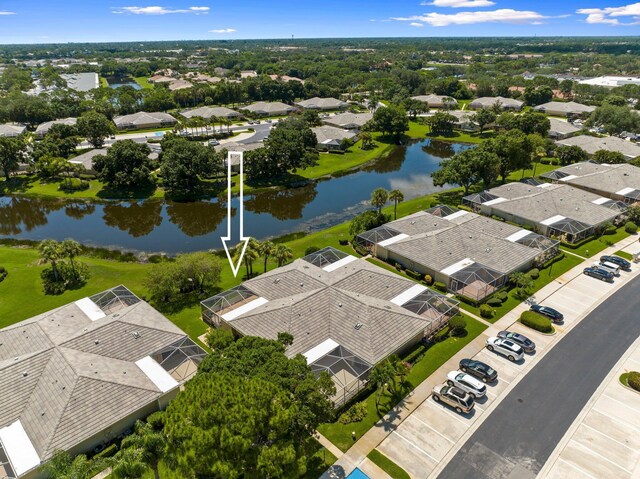 1217 NW Sun Terrace Cir Unit B, Port Saint Lucie, FL 34986 - aerial perspective of suburban area with a large body of water