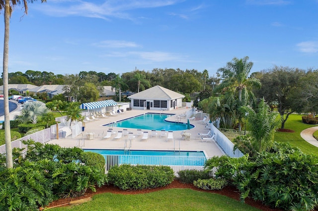 view of swimming pool with a patio