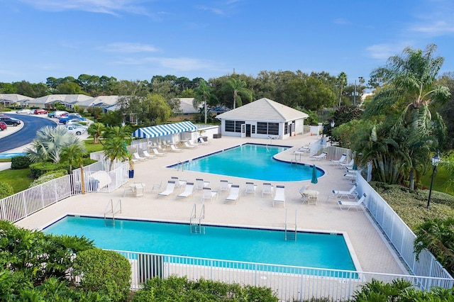 view of pool featuring a patio