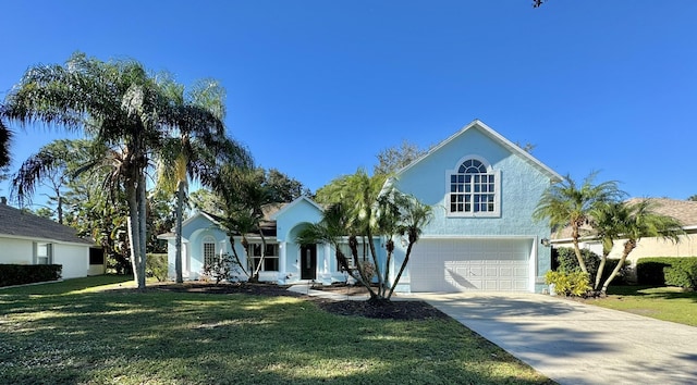 view of front facade featuring a front yard and a garage