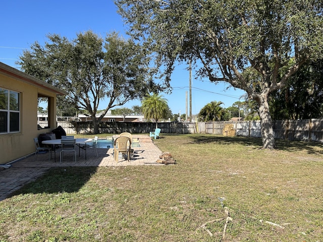 view of yard with a patio area