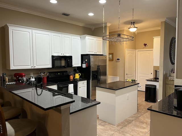 kitchen with black appliances, kitchen peninsula, ornamental molding, light tile patterned flooring, and white cabinetry