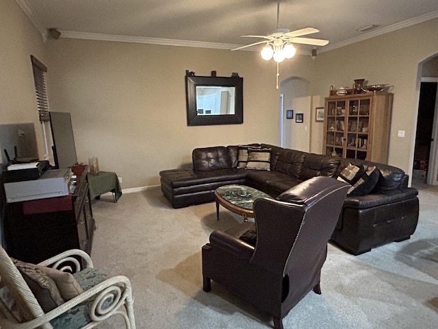 living room with light carpet, ceiling fan, and ornamental molding