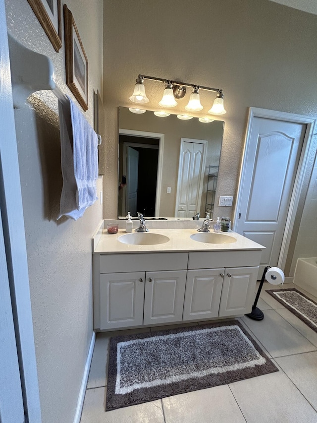 bathroom featuring tile patterned floors and vanity