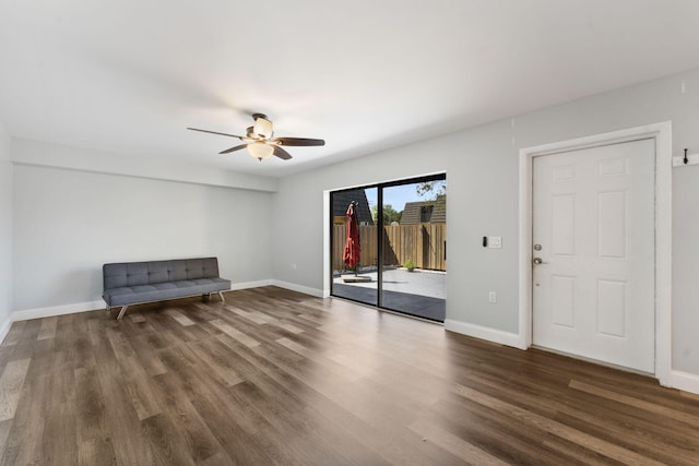 interior space with dark hardwood / wood-style floors and ceiling fan