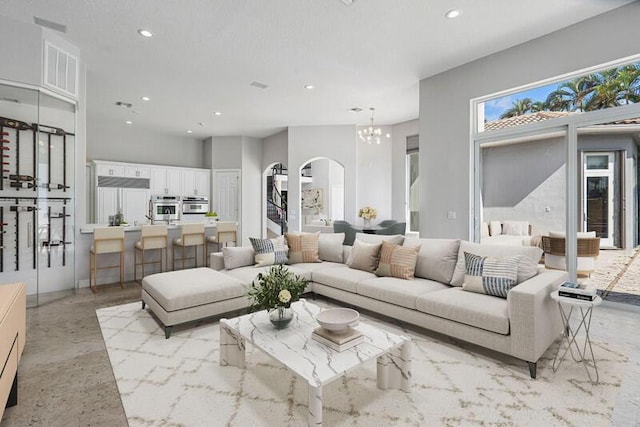 living room with a chandelier