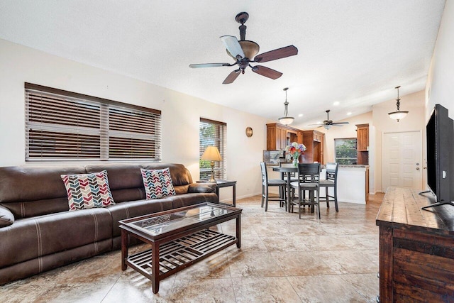 living room featuring a textured ceiling and lofted ceiling