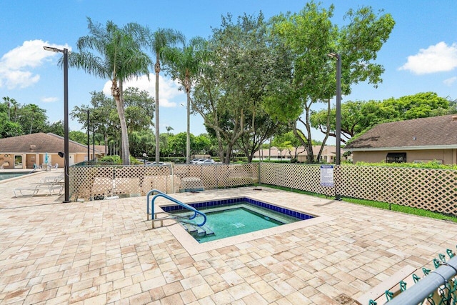 view of swimming pool featuring a patio