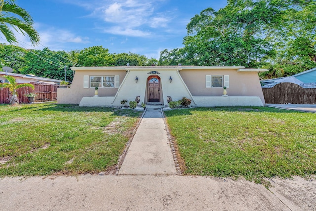 view of front of home with a front yard