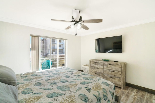 bedroom featuring hardwood / wood-style flooring, ceiling fan, and ornamental molding