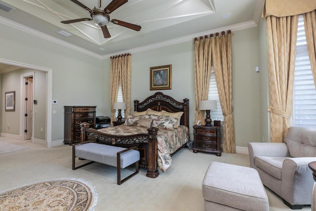 bedroom featuring visible vents, light colored carpet, ornamental molding, a tray ceiling, and multiple windows