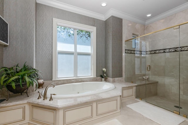 bathroom with ornamental molding, a stall shower, a garden tub, and wallpapered walls