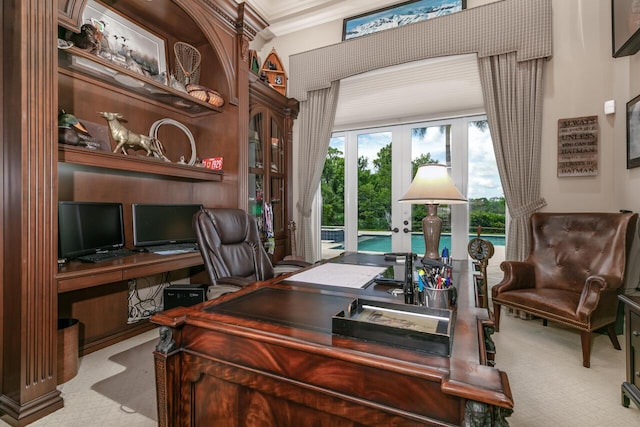 office area with ornamental molding and french doors