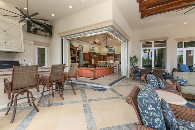 view of patio with a ceiling fan, outdoor dining space, outdoor lounge area, and a grill