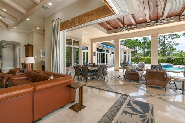 interior space with recessed lighting, visible vents, a high ceiling, ceiling fan, and beamed ceiling