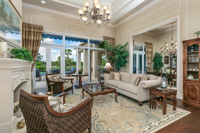 interior space featuring french doors and an inviting chandelier