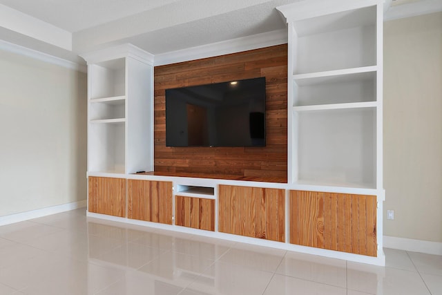 interior details featuring built in shelves and crown molding