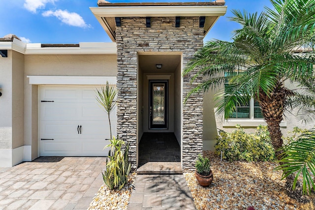 property entrance with a garage