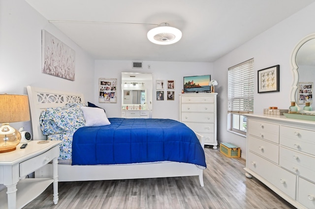 bedroom featuring light hardwood / wood-style floors