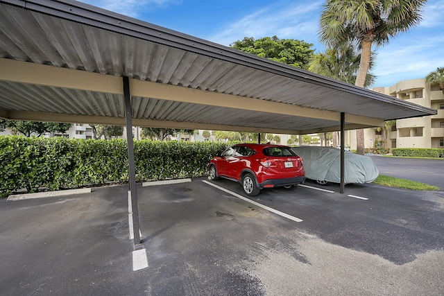 view of car parking featuring a carport