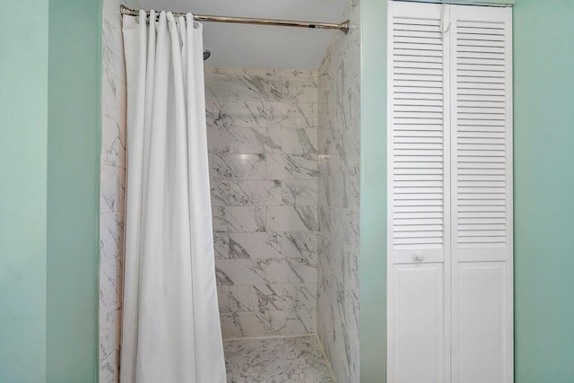 bathroom featuring walk in shower