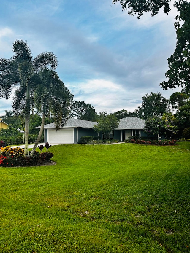 view of yard featuring a garage