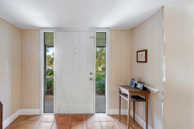 foyer entrance featuring light tile patterned floors