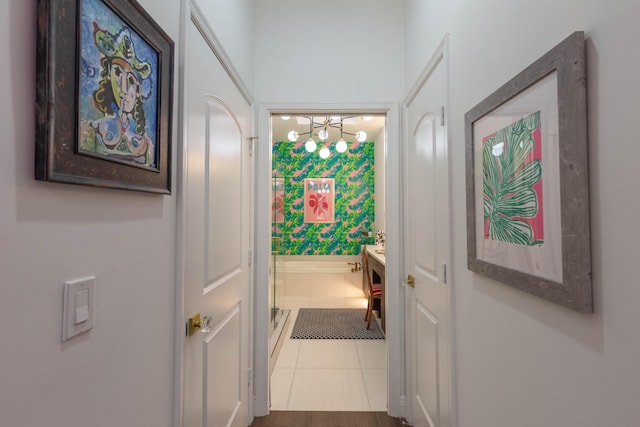 701 S Olive Ave Unit 409, West Palm Beach, FL 33401 - entryway featuring a chandelier and tile patterned floors