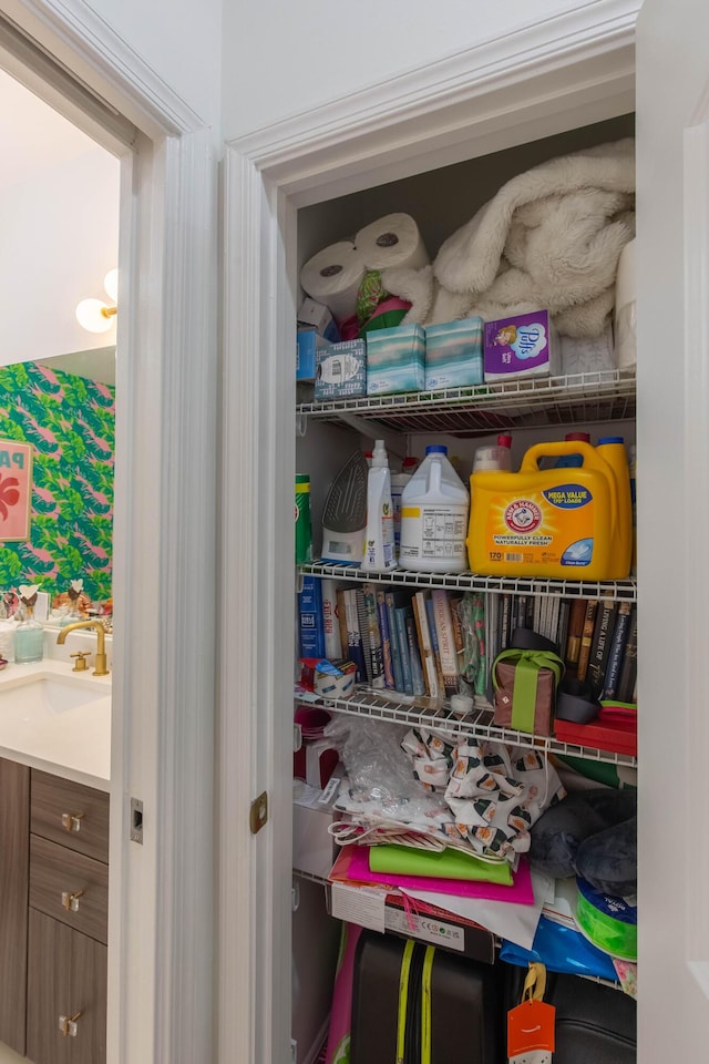 701 S Olive Ave Unit 409, West Palm Beach, FL 33401 - pantry featuring a sink