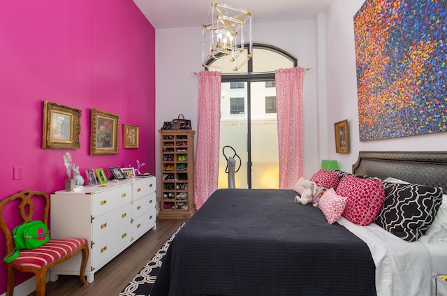 bedroom with wood-type flooring