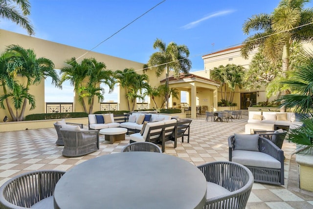 701 S Olive Ave Unit 409, West Palm Beach, FL 33401 - view of patio / terrace with an outdoor hangout area and outdoor dining area