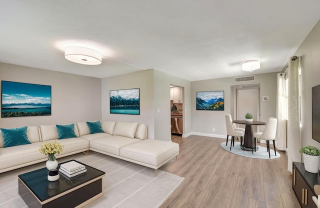 living room featuring light wood-type flooring