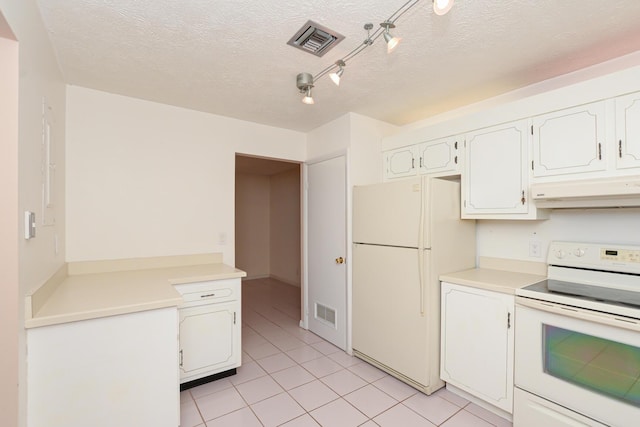 kitchen with a textured ceiling, white cabinetry, and white appliances