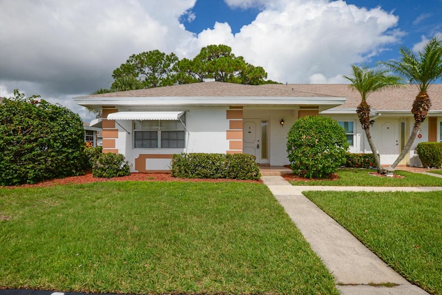 view of front of house with a front yard