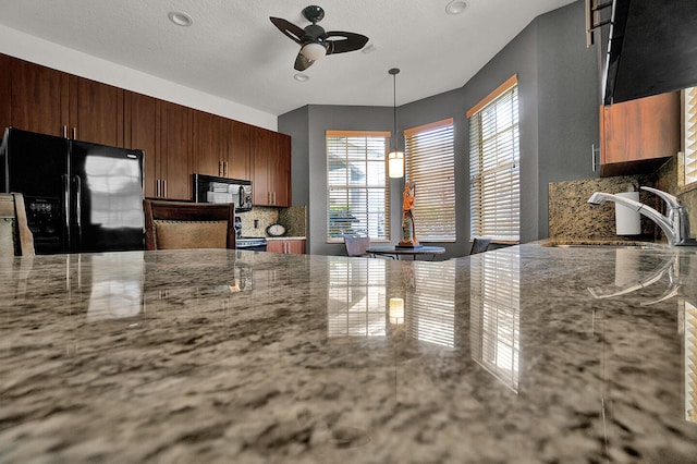 kitchen featuring black appliances, a sink, ceiling fan, tasteful backsplash, and recessed lighting