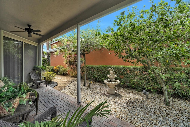 view of patio / terrace featuring a ceiling fan