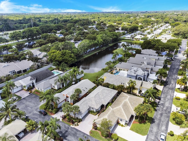 aerial perspective of suburban area featuring a nearby body of water
