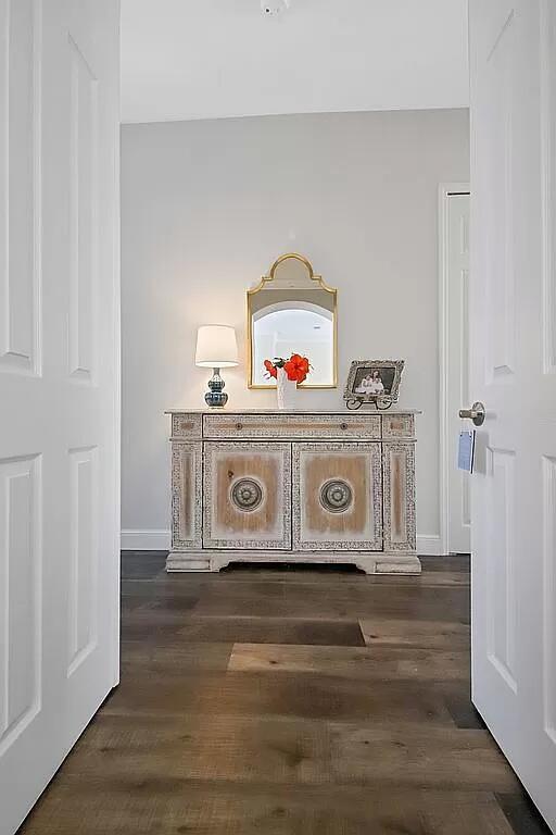 room details featuring wood finished floors and baseboards