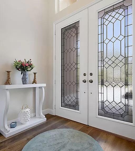 entrance foyer featuring dark wood-type flooring and french doors