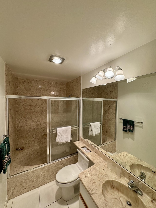 full bathroom with toilet, vanity, tile patterned floors, and combined bath / shower with glass door