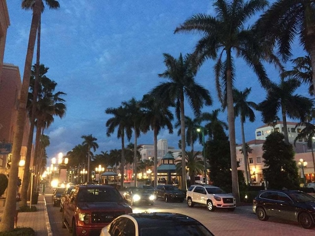 view of parking at night