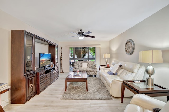 2004 Granada Dr Unit L2, Coconut Creek, FL 33066 - living room featuring a ceiling fan, baseboards, and light wood-style floors