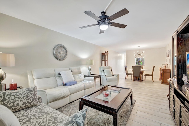2004 Granada Dr Unit L2, Coconut Creek, FL 33066 - living area featuring a chandelier, a ceiling fan, and light wood-type flooring